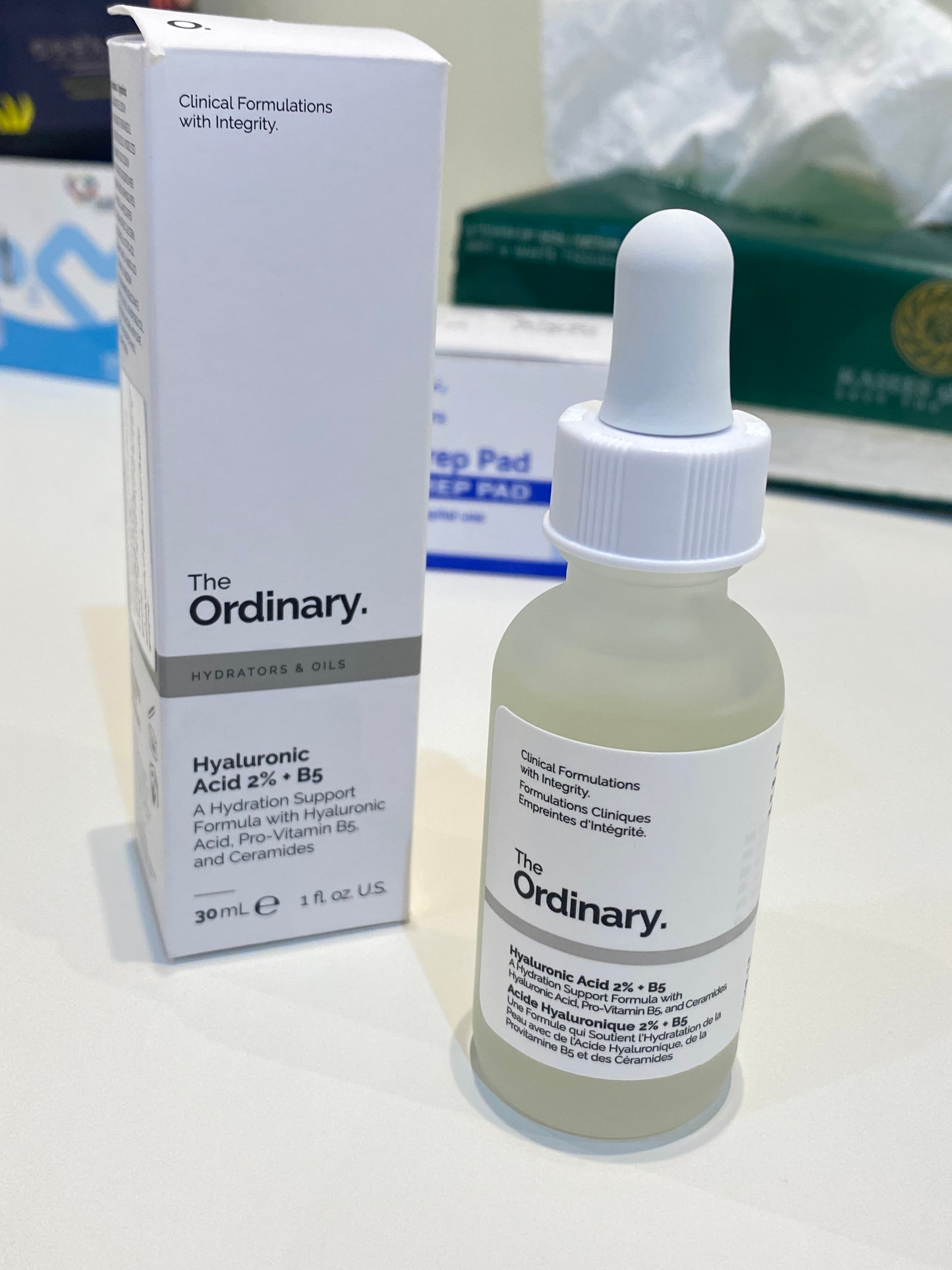 Close-up image of the clear bottle of The Ordinary Hyaluronic Acid serum